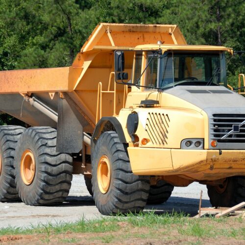 Mining truck with large tires illustrating the need to identify and fix tire defects.